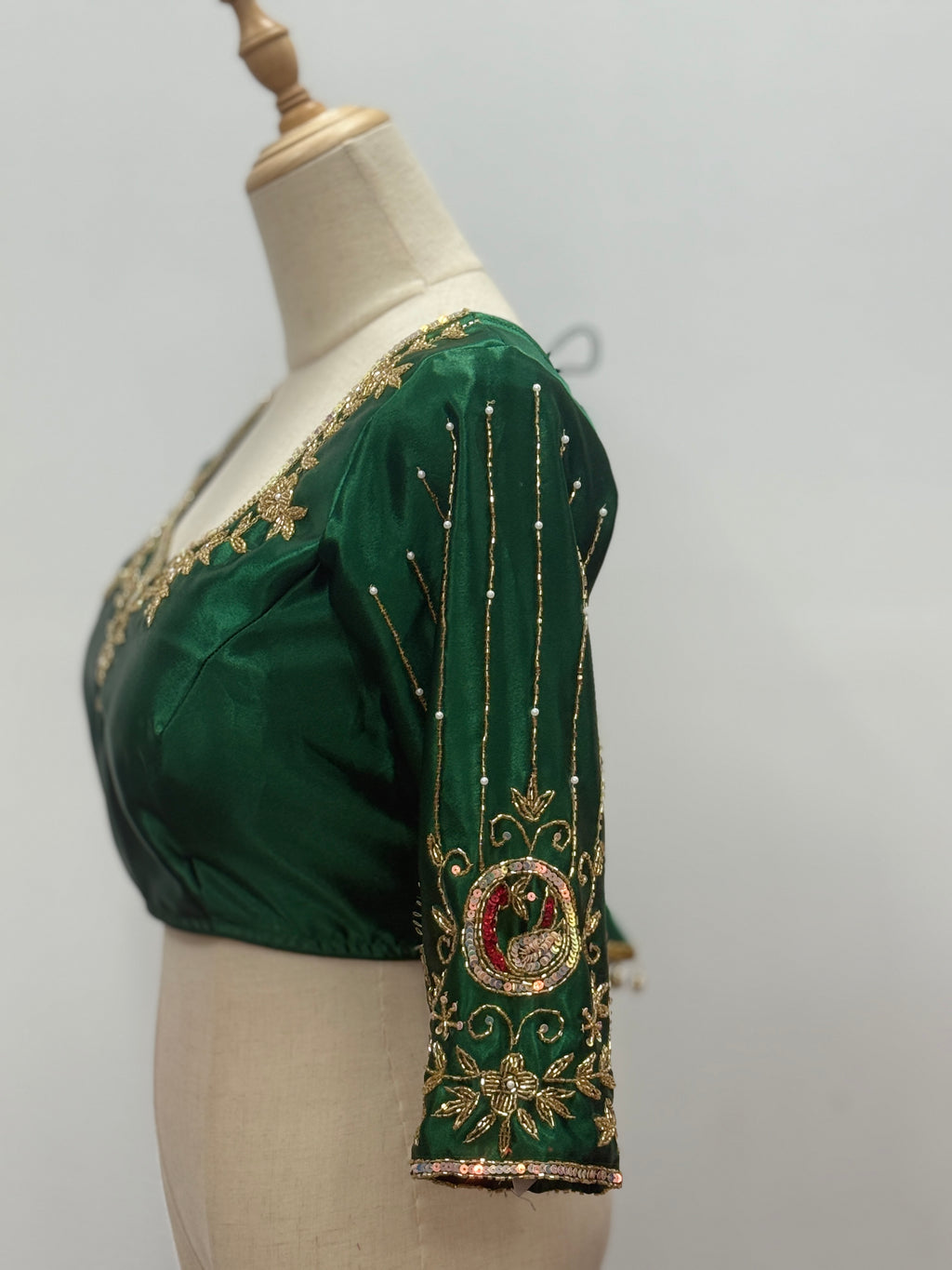 Radiant Peacock Embroidered Silk Blouse