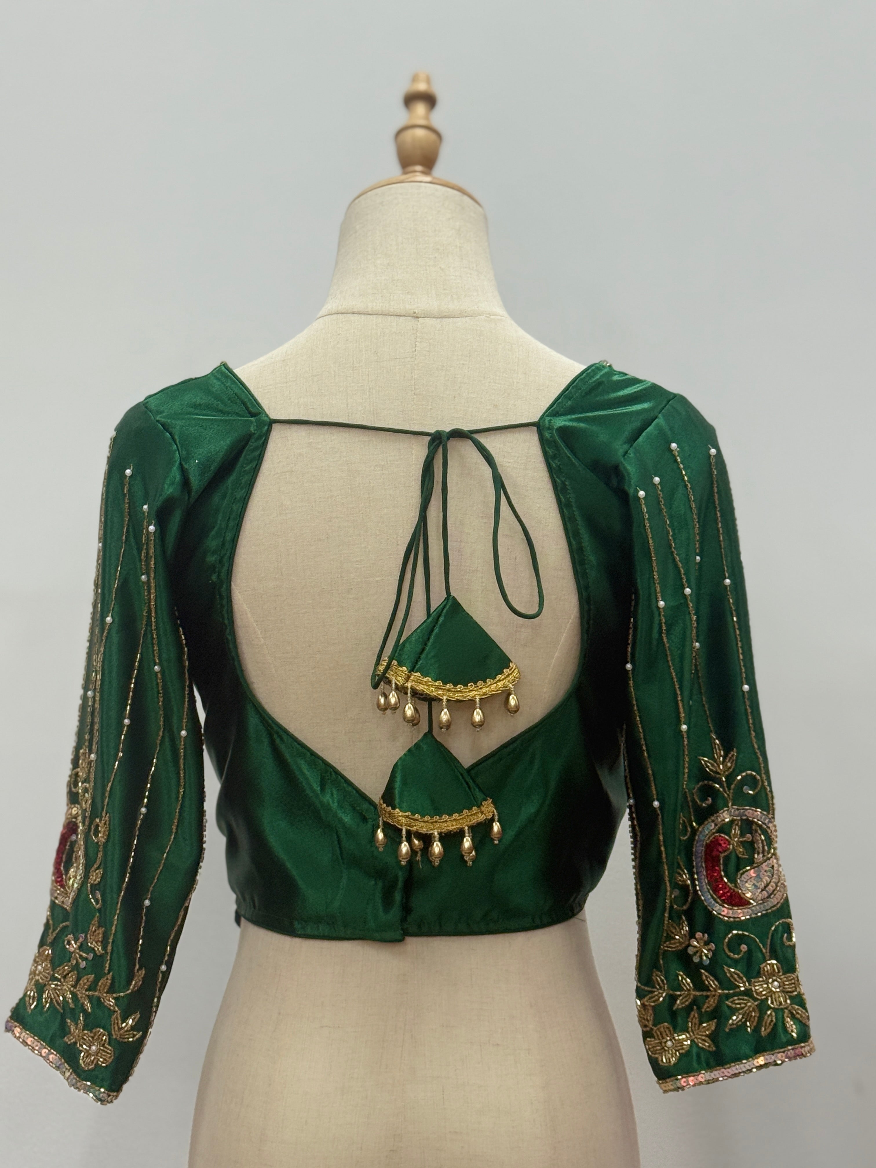Radiant Peacock Embroidered Silk Blouse