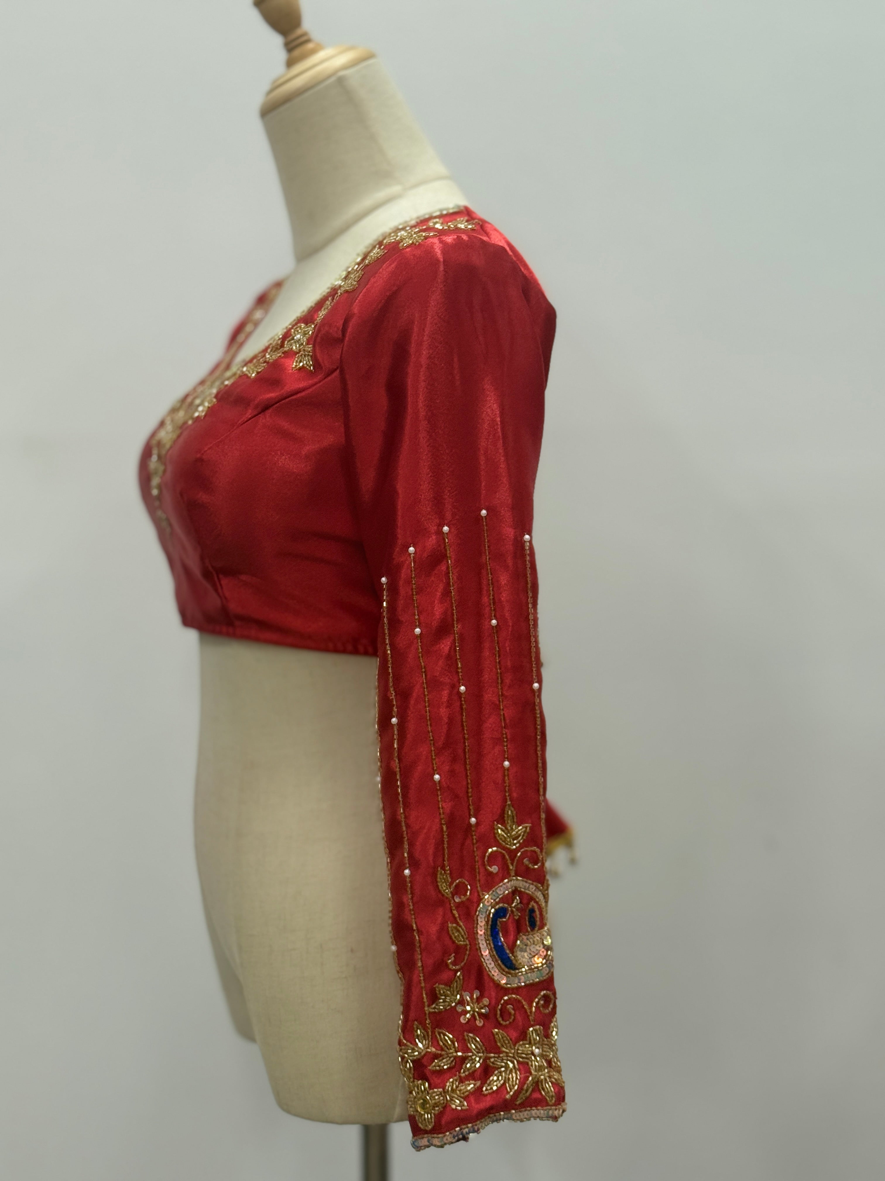 Radiant Peacock Embroidered Silk Blouse