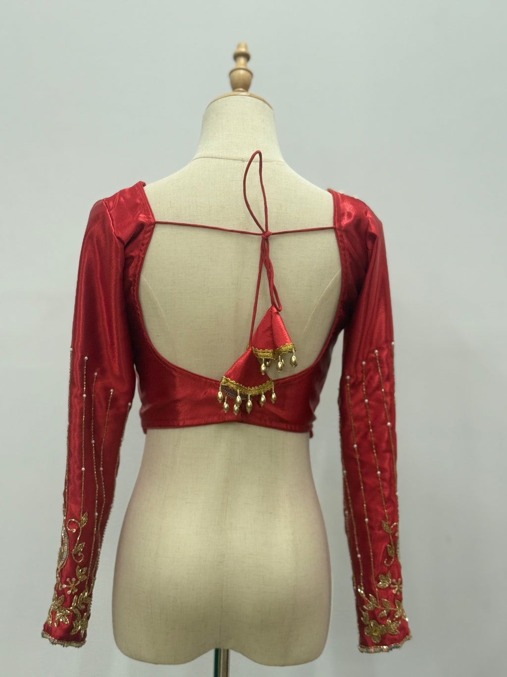 Radiant Peacock Embroidered Silk Blouse